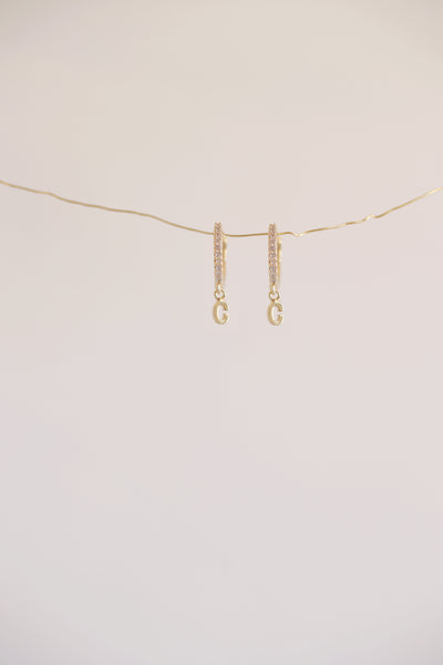 The Mini Monogram Huggie Earrings