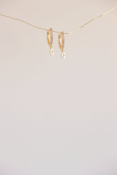 The Mini Monogram Huggie Earrings