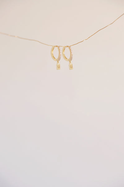 The Mini Monogram Huggie Earrings